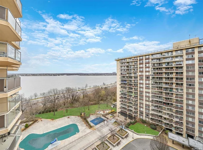 Resort style living awaits the new owner of this 2-bed, 2-bath unit in this luxury high rise building located in the highly sought-after Bay Terrace neighborhood. The Versailles is the centrally located building in the three-building development. Unit opens to an expansive balcony with magnificent water views of Little Neck Bay.Unit also boasts hardwood floors all throughout and under carpet, central AC, master bedroom with master bath that can comfortably accommodate a king size bed plus furniture and a second bedroom that can accommodate a queen size bed plus furniture. Each of the 2 bedrooms has water views. Subletting allowed after 2 years of shareholder residency. All utilities including AC included in monthly maintenance fee. When you decide to venture out, the building is replete with amenities for you to enjoy: State-of-the art fitness center with steam room & convenient fitness class schedule, 24-hour doorman and security, concierge service, in-ground, outdoor heated pool with concession stand, in-building delicatessen serving breakfast, lunch & dinner and stacked with snacks, on-site vending machine for late-night treats, newly renovated laundry room, dry cleaners, clubhouse for hosting parties and events, basketball court, five private tennis courts, hair & nail spa, children&rsquo;s playground and indoor & outdoor garage parking. The neighborhood rivals the development with a waterfront park nearby with serene bike and jogging path, Bayside Marina for sailing aficionados or venture 5 minutes out to the Clearview Park golf course if you want to work on your swing. Better yet, craft a day&rsquo;s agenda that involves a decorating and shopping spree at Home Goods, one of the many stores in Bay Terrace Shopping Center 0.5 miles away then round out the day with dining at any of the top-rated local restaurants and a movie at AMC theater in the same shopping center. The convenience of Cross Island Pkwy. only minutes away, the LIRR Bayside 9 minutes away or Express QM2 3 minutes away makes getting around town a cinch. There is nothing more left to say about a great unit situated in a great building and located in a great neighborhood . . . except, come see it for yourself!, Additional information: ExterioFeatures:Tennis