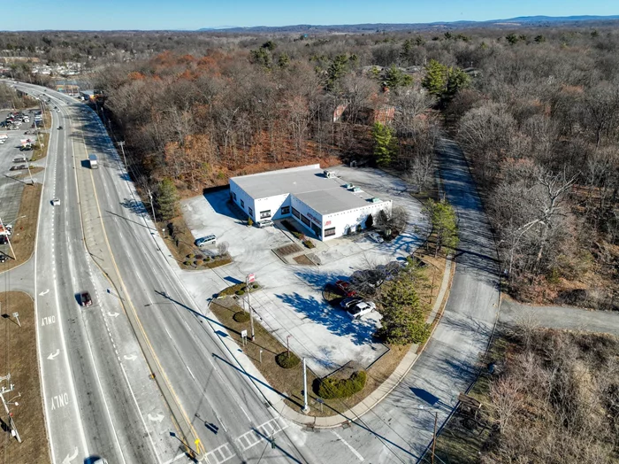 1676 Route 9 Wappingers Falls is a well-maintained 11, 090 single-user retail building on 1.66ac along a bustling commercial corridor. Located at a signalized intersection along the busiest state highway in Dutchess County NY, the site features a 62-car private lot, private well/septic, natural gas, monument signage, and is currently fitted for showroom, office, storage use. Ideal for owner-occupiers or investors, as it could be sub-divided and occupied by multiple tenants.