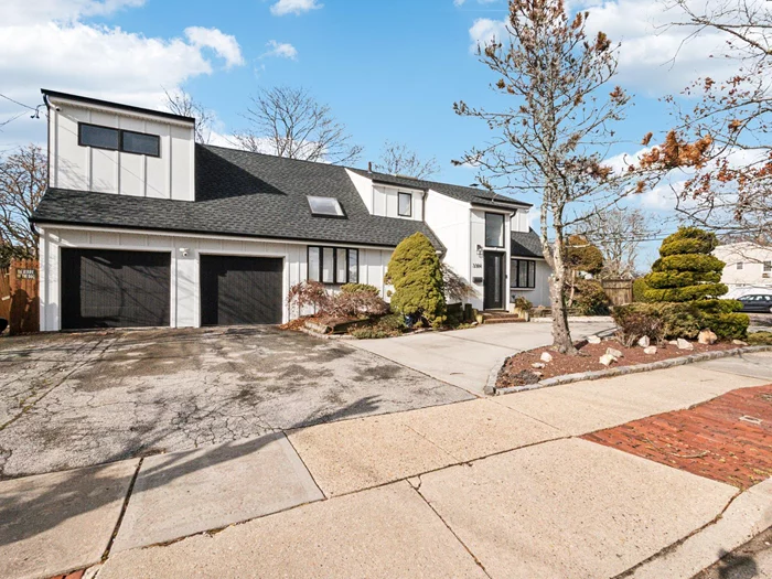 Step into this beautifully designed 4-bedroom, 2-bath Contemporary home, where modern elegance meets comfort. The open floor plan welcomes you with soaring vaulted ceilings, skylights, and hardwood flooring throughout. A sun-drenched eat-in kitchen (EIK) boasts granite countertops, stainless steel appliances, and double-paned slider doors leading to an expansive wood deckâ€”perfect for entertaining. Cozy up in the great room/den featuring a wood-burning fireplace, ideal for chilly evenings. The oversized primary bedroom is a retreat of its own, with vaulted ceilings, a walk-in closet, and an attached sunlit sitting room/home office. Spacious secondary bedrooms and updated bathrooms complete the homeâ€™s inviting interior. Situated on a generous corner lot, this property features a fully fenced yard for added privacy and outdoor enjoyment. Don&rsquo;t miss the opportunity to make this sunlit and spacious Contemporary home your own!