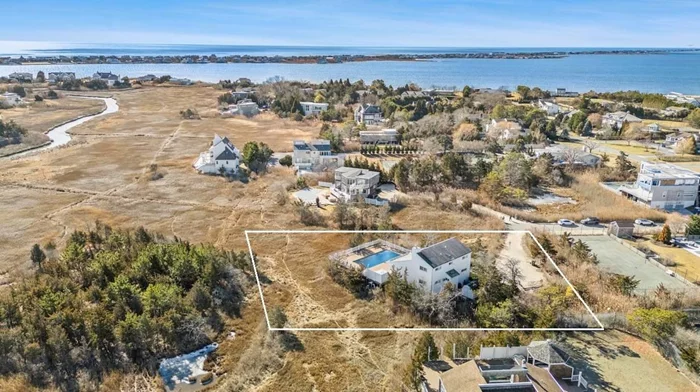 Nestled south of the highway overlooking a picturesque estuary in one of Westhampton Beach&rsquo;s most sought-after areas. With panoramic views and brilliant sunshine, this beach home offers a peaceful escape living within nature. Just moments to the Village&rsquo;s boutique shops, restaurants and private beach. Currently stands a 4 bed, 3 bath contemporary with vaulted great room flooded with natural light designed for indoor/outdoor living. An expansive south facing deck with heated pool, outdoor shower and Dimension One spa. This exceptional property also has DEC approval and permits for a new 3, 600 sq. ft. modern build with five bedrooms and a heated gunite pool. Whether you choose to enjoy the home as it is today, renovate or build your dream retreat, this prime location provides effortless access to all the area has to offer. It&rsquo;s time to make 16 Meadow Lane your own.