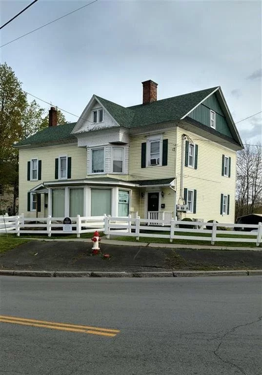 Calling all Investors! Three buildings on a corner lot in a high traffic area on State Route 42, 547 Broadway, Monticello, NY Has a positive cash flow, Apt #1, one bedroom is rented for $1050/month. Apt #2, two bedroom is rented at $1, 300/month, Apt # 3- one bedroom is rented at $1, 000/month and the custard stand (separate retail building) is rented for $1, 500/month. Owner pays taxes, water, sewer, Lawn, snowing plowing and insurance. Tenants pay electric. The owner would continue to rent one of the offices on the first floor. Great location, plenty of parking walking distance to shopping, transportation and restaurants.