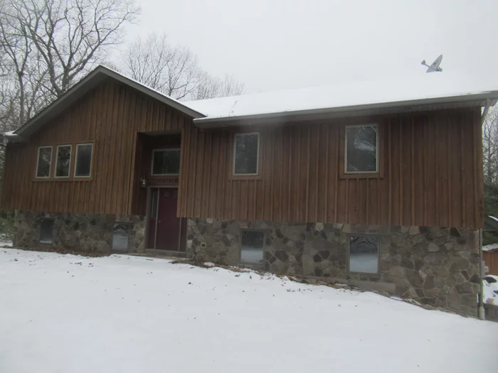 Looking for privacy? This 4 Bedroom, 2.5 Bathroom Raised Ranch on 3.87 wooded acres in Town of Fallsburg just might be what you are looking for! Huge kitchen with tons of cabinet & counter space. Main living consists of formal dining room with sliding doors to the rear deck, living room with cathedral ceilings, primary bedroom with full bath & 2 additional bedrooms. Lower level with additional bedroom, bath, office & family room with fireplace. Plenty of parking in your 2 car garage. Close to Route 17, Resorts World Casino, Monticello, Bethel Woods, Yankee Lake, shopping, schools and amenities.