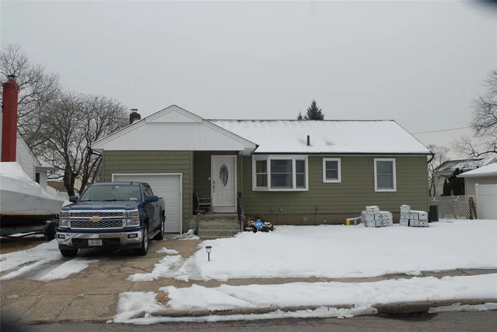 Ranch style dwelling in Central Manor section of East Meadow; Vinyl Siding & Insulated windows-1 year old; Central A/C- 1 year old; Kitchen and Bathroom 1-year old; Electric Updated to 200 amp with new service from the pole; Basement has been Framed./