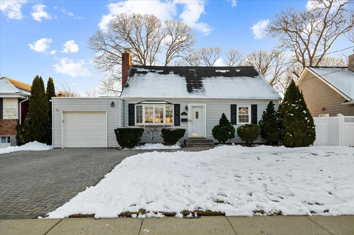 This stunning expanded Cape in Nassau Shores community is a rare find, offering the perfect balance of classic charm and modern upgrades. With four generously sized bedrooms, this home provides ample space for comfort and privacy. The beautifully updated bathrooms showcase high-end finishes and stylish design, creating a spa-like retreat. The heart of the home is the chefâ€™s kitchen, featuring radiant heat flooring for year-round warmth and comfort, along with sleek countertops and top-of-the-line appliances. The fully finished basement expands the living space, ideal for a home office, media room, or fitness area. Each room is thoughtfully designed, with sun-drenched interiors and an inviting ambiance. Outside, enjoy a serene backyard perfect for relaxation or entertaining. The home is also equipped with in ground sprinklers and a home security system. Situated just moments from the golf course, this home offers a prime location for those who appreciate an active lifestyle. Experience the best!