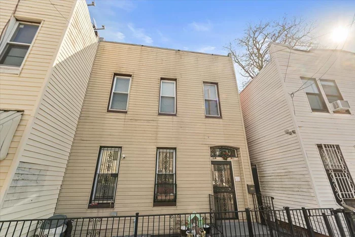 This two family home in Ridgewood, Queens has two three-bedroom apartments and a finished basement. The property features 1, 428 square feet plus the basement square footage. Each unit has three bedrooms and one full bathroom, with a separate kitchen and living room. This home also comes with a large backyard.