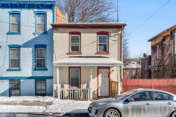 LOCATION IS KEY!!! Discover this charming 2-bedroom, 1-bathroom turn-of-the-century Rowhouse in the City of Newburgh, within the Newburgh School District. This home offers unbeatable convenience, surrounded by local dining, shopping, parks, and essential services. Just two blocks from Montefiore St. Lukeâ€™s Cornwall Medical Center and near Mount Saint Mary College, itâ€™s also less than a quarter mile from the scenic Hudson River. With Route 9W just blocks away and easy access to the Newburgh-Beacon Bridge and I-84 (just 10 minutes away) which provides easy access to the Metro North Railroad making commuting is a breeze. Call today for your own private showing!!!