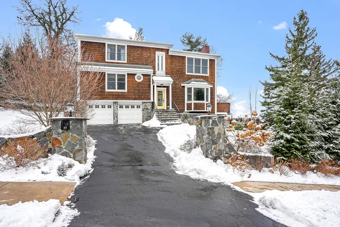 Stunning Hudson River views in the village of Croton on Hudson! Designed to frame the river and mountains through oversized windows on both levels, this home features soaring ceilings, hardwood flooring, stone accent walls, and a natural gas fireplace. The primary suite features a large soaking tub and two walk in closets. The bedrooms are generously sized and include special touches like a ceiling-mounted swing chair. Featuring an open floor plan, finished walkout basement, expansive deck, balcony, and patio area with fenced-in yard, the home provides plenty of room for entertaining. Or for a cozy evening alone, sit together on the balcony and enjoy a cocktail at sunset. Outdoor enthusiasts will appreciate proximity to the Croton Dam, hiking trails, and kayaking opportunities (kayak included in your 2-car garage). Commuters will appreciate arriving at Grand Central by train in less than an hour from Croton station. This is a must-see property that will not last long.