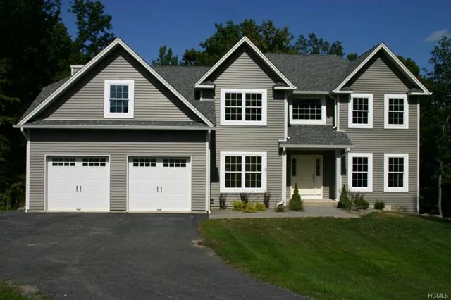 CUL-DE-SAC LOCALE, MOUNTAIN VIEWS&OVER 8 ACRES OF PRIME PROPERTY!Finishing touches being made to this elegant 4/5 BR 2.5 BA stunning Colonial w OVER 3, 200 SQ FT set perfectly in cul-de-sac featuring circular driveway.Dramatic 2-story entry w grand stairway&open floor plan.Kitchen has solid wood cabinetry, granite counters, large eating area w sliders to a large outdoor deck.stainless steel appliances, large pantry&ceramic tile.Tremendous Great RM w vaulted ceiling, tons of windows&striking F/P.Formal dining and gracious living, HARDWOOD FLOORS THROUGHOUT, master suite w HIS/HERS CLOSETS, MBA w W/P tub.Full basement w 9FT CEILING.Close to shopping, EZNYC commute.Award winning M-W Schools.Woodbury Rec.