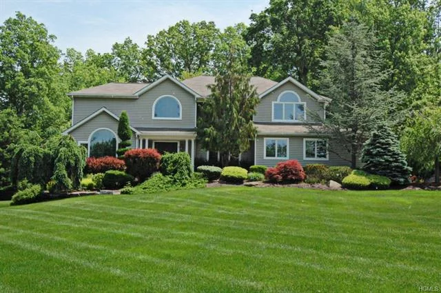 Woodbury&rsquo;s finest community has this graceful Colonial available for the first time. The open floor plan offers a newer gourmet kitchen includes fine cabinetry newer sub zero frig, center island with granite and gas stove, stainless steel apl. Vaulted ceiling in the family room w/ gas fireplace. formal living room w/ palladium window, large formal dining room incl crown and picture frame moldings. updated 1/2 bathroom and office/bedroom. Master suite w tray ceiling, two walk in closets and the finest tastefully renovated bathroom available. three other large bedrooms. The main bathroom was just completed w fine tiles and granite counters. Hardwood floors through out the house exc bedrms Newer 3 zone central air. The professionally landscaped yard has stone walls and mature plantings also w sprinkler system. Large deck off the eat in kitchen over looks the completely private yard. The owner have maintained or updated this home with top of the line items. Why wait for new construction!