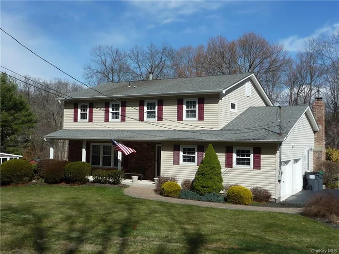 Beautiful Colonial in the heart of Woodbury Hardwood floors through out the house. Formal living room and dining room, large kitchen with pantry, family room with brick fireplace and sliding glass door to deck that overlooks the private level yard. Updated 1/2 bath and mud room. Upstairs has three large bedrooms with large closets and updated bathroom. Master suite with walkin closet and updated full bathroom. Unfinished basement. Newer siding, windows, roof and boiler.Central air. Close to both Woodbury rec centers. Great commuter location.