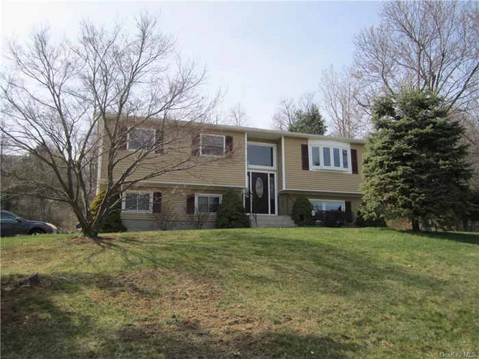 Lovely Bi-level in great commuter friendly development. Formal dining room with new hardwood floors & sliders to oversized deck, Living room offers energy saver bright new picture window. Views of mountains are generous since this home faces West Point Mountains and State land!! This home has had numerous upgrades in the past 6 - 10 years, Windows, Roof, Furnace, How Water heater and more! Newly remodeled kitchen with stainless appliances, silestone counters, and movable island for care-free entertaining and cooking. Some new hardwood in hall and dining area accompanied by parquet wood floors under carpeting. The lower level offers laundry room and ideal second kitchen, just add a stove and you can create the perfect area for your Mom!! This sought after area offers Woodbury Recreation Lake, tennis, skating and playground. Or if you prefer a pool, then the Central Recreation area fits that need. Your choice because Woodbury living offers both!!