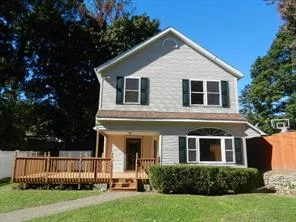 Inviting 2 story colonial style set back on level lot. Newly renovated with luxury entry door, hardwood floors, gourmet kitchen, and extra- large living room. New Peerless boiler. Private drive for several cars.