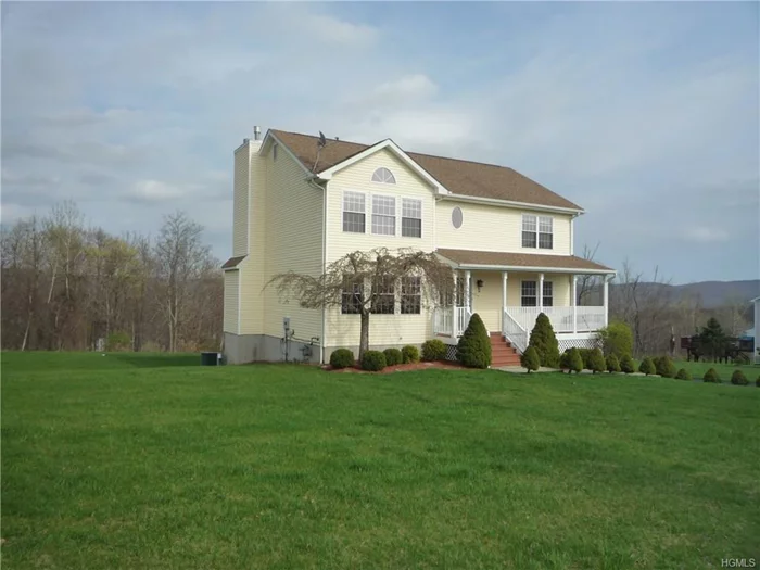 Spectacular two story entry, large formal dining room and living room, family room with fireplace overlooking the open kitchen with Granite counters and stainless steel appliances. Half bath with contemp flair. Second floor has three large bedrooms with full bathroom plus a master bedroom with vaulted ceilings and full bathroom incl whirlpool tub and large walkin closet. The walk out basement is partially finished. Great mountain views, Woodbury Recreational center and close to mass transit and highways.