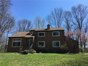 Diamond In The Rough! This contemporary home is located on .90 acres on a quiet cul-de-sac in Cortlandt Manor, New York. Great features include: almost 2, 100 sq feet of interior living space, 4 bedrooms, 3 bathrooms, eat-in-kitchen, 2-car garage, deck off the kitchen and a walk-out basement. Bring ideas, tools, and some elbow grease to make this your home!