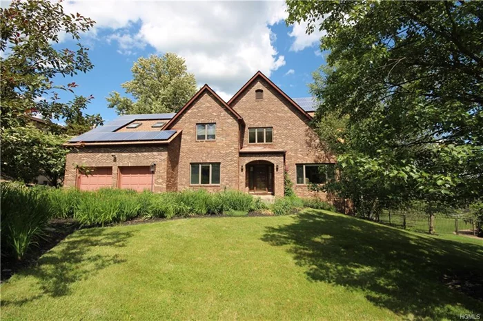 Look no further! This gorgeous, tudor-style home, situated in the desirable Woodbury Estates, has it all! A large, bright foyer welcomes you into the main level of this house; which offers an expansive kitchen with a separate eating area, a formal dining room, a library, living room, laundry & powder room. Enjoy the views of the mountains via the many large windows all through the house. The second floor boasts 5 spacious bedrooms, all with gleaming hardwood floors, that run throughout the home. Enjoy the convenience of central air conditioning and central vac. The walk-out finished basement, with the 3rd full bathroom, is ideal for guests, a gym or play room. Reap the benefit of a minimal electric bill the solar panels provide. Being a resident of Woodbury allows access to Earl Reservoir & the Central Valley Pool, where you can swim, fish & play tennis. This home is conveniently located close to Woodbury Commons premium outlets, restaurants, major highways and public transportation.