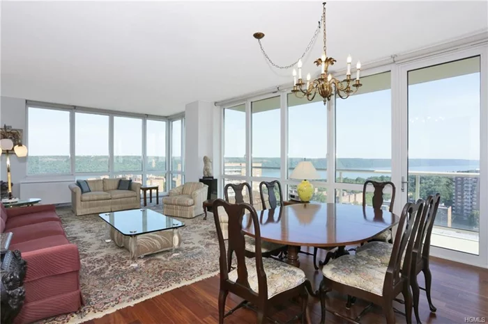 This elegant home is designed for living on a grand scale, and its views are no exception. Rising high above the Hudson, this residence features an oversized balcony that graciously expands the living area and offers breathtaking views from sunrise to sunset. Awe-inspiring protected vistas including the Hudson River, Palisades, George Washington Bridge, and Van Cortland Park. Relax, sun bathe or simply savor the panoramic views on the rooftop terrace. View the stars and planets from Solaria&rsquo;s private observatory. Here, luxury living quickly becomes second nature. There are full floor to ceiling windows and extensive closets. The kitchen has cherry wood cabinetry, granite countertops and high end appliances. The master bedroom has 270 degree views and the master bath offers floor to ceiling Jerusalem stone, radiant floor heat, his and her sinks with a triple width recessed medicine cabinet, a frameless glass shower and a large, and a soaking tub. There is a 100 sf balcony.