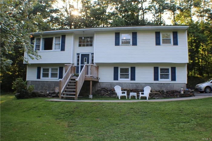 Step into this well maintained home full of character! You&rsquo;ll enjoy many years to come in this warm and inviting home set upon 1.5 acres in the Town of Woodbury. Features large kitchen with Corian counter tops with an open floor plan into the dining and living rooms. Four bedrooms and two baths. There&rsquo;s a fireplace in the den in the lower level. Park in the two car garage and be protected from inclement weather. In the Monroe Woodbury school district with less than a 10 minute drive to Woodbury Commons, the NYS Thruway and Route 17. Ideal for commuters. Call for an appointment today!