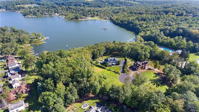 Quiet cul-de-sac setting. This approved 3 acre building lot has 240 feet of Peach Lake Water Front. Located in an upscale neighborhood, this rare offering allows the buyer to build their dream house.