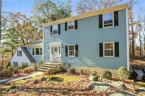 Large, bright, open colonial, with formal living and dining room, informal living room with wood-burning fireplace, spacious eat-in kitchen with new stainless steel refrigerator and separate office/den with storage access leading to large storage area over the garage. Formal dining room, with custom molding and wainscoting. Washer and dryer on the main floor, adjacent to the back door with access to the deck and yard. Four large bedrooms on upstairs level, master bedroom and three large sized guest bedrooms. Extremely large, spacious master bedroom with en-suite master bathroom, double closets and additional walk-in closet. Access to the attic through the walk-in closet. Unfinished large basement, with access to the two car garage. Large, newly painted deck with huge entertaining potential. Quiet cul-de-sac location, close to Route 202 with access to the Taconic State Parkway, Bear Mountain State Parkway and only 10 minutes from Cortlandt Metro North Station.