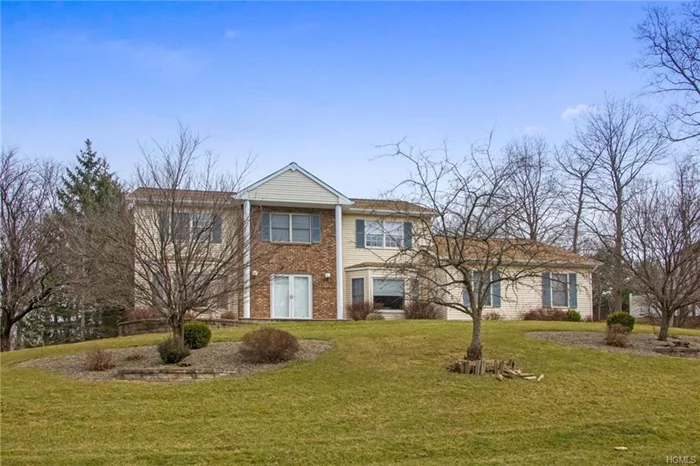 Pride of ownership reigns throughout this beautiful Woodbury home.The gracious ceramic tiled foyer is flanked by the formal living room and dining room;both with hardwood floors and bay windows.The ceramic tile flows into the huge kitchen that offers stainless steel appliances, extensive counters and cabinets;plus a center island for the most creative cooks!There&rsquo;s a good sized breakfast area as well, with adjacent sliders to the oversized deck.Cozy up to the woodburning brick fireplace in the family room.Upstairs the large master bedroom features hardwood floors, recessed lighting, and huge walk in closet.The en suite bath has an inviting whirlpool tub, tiled shower and double vanities.3 additional generously sized bedrooms complete this floor. If you like to entertain, this fully finished basement is for you! Plenty of room for that pool table and more!And there&rsquo;s more space for that home gym too, as well a convenient powder room.Woodbury recreation is only a short walk.Minutes to highways.