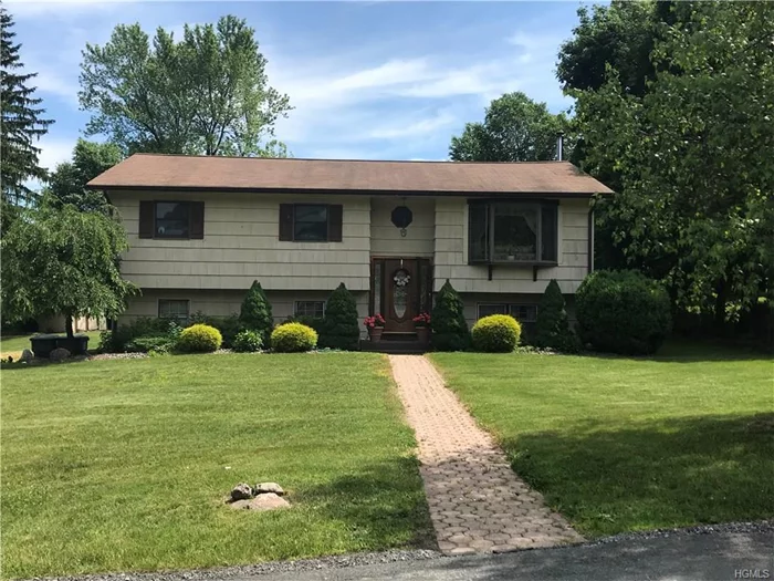 Cornwall Schools !!! Valley Forge. Beautiful Mountain Views. Minutes to the NYS Thruway and Train Station. This Spacious Raised Ranch offers a large Living room for entertaining. Formal Dining room with bay window. Open Eat in kitchen with beautiful wood cabinetry, lots of counter top space and recessed lighting. Tiled Full bathroom. Master bedroom. 2 additional nice size bedrooms. Attic area. Lower level features a warm and inviting family room with a wood burning brick fireplace. Separate Laundry Room. Office/ Den. Mud room and garage. Beautiful Level, usable, private corner lot. Oversized 2 Tier Deck  CENTRAL AIR CONDITIONING. MUST SEE !