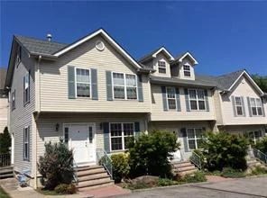 Great space end unit town home with lots of natural light. Hardwood floors.  Finished lower level with family room, laundry and second bath. Lots of storage. Central A/C.  Patio off dining area. Door off kitchen to small side yard. 2 Parking spaces included.  Walk to Glen Island Park & Beach.