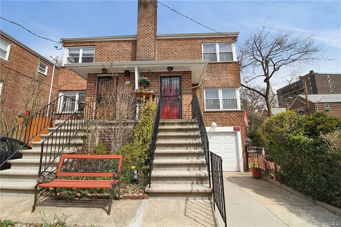 Semi-detached legal 2 family, solid brick 2 bedrooms over a studio, 1 car garage under. Attractive corner setting, south and east facing, light filled rooms. Fenced yard , outdoor patio, seasonal flower garden. Van Cortlandt Park, #1 subway, express and city buses. Public and private schools, adjacent to shopping, nature walks.