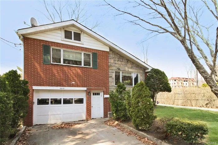 The main floor of this Split level brick house is a modern open plan and includes a large kitchen with stainless appliances, a granite island, a spacious dining area and a large living room. Upper level includes a master bedroom with en suite bathroom, two additional bedrooms and a full bathroom with washer/dryer. Another level up boosts a large bedroom with en suite. The lower level has a powder room and a spacious family room that leads out through sliding doors to a lovely patio and private back yard. The basement level has a guest room, playroom, a full bathroom and a laundry room with washer/dryer. There is access to a one car garage. Driveway in front for additional car. House was renovated in 2013 and has central air conditioning. Conveniently located next to a community facility that boosts a salt water pool and a state of the art gym. Close to schools, shopping and transportation. Photos coming!!!