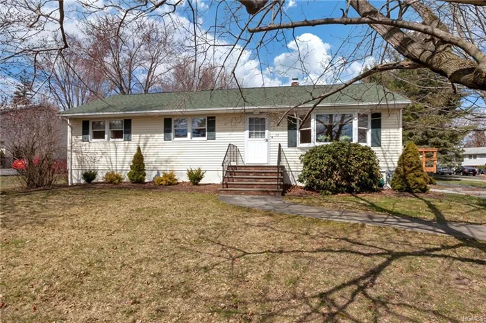 Adorable ranch/split level home has been meticulously maintained and is in an excellent commuter location. Beautiful hardwood floors can be found throughout. The generous sized living room has a bay window that floods the room with natural light. The eat in kitchen has tons of cabinets for storage, a Jenn-air range and leads to the dining room with sliders out to the deck. There are three additional bedrooms all generous in size and a full bathroom that completes the first floor. The second level features the master suite. The large master bedroom has a vaulted ceiling, tons of windows and a master bath. The 1 1/2 car garage is large enough for a car and a workshop. Other features include; updated furnace (2009),  hot water heater (2014), shed, water softener, Andersen windows and central air. Two minutes to the NYS Thruway and the Woodbury Commons. Woodbury Recreation is included in the taxes and offers swimming, fishing, boating and tons of community events.