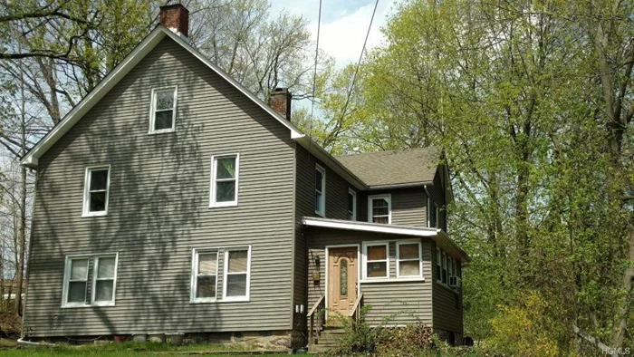 Older style home with renovations that have started. New kitchen with granite countertops, hi hats, and pantry. Formal dining room with hardwood floors. Updated bathrooms. Newer roof and windows. Updated stainless steel appliances including front load washer and dryer. Newer roof and vinyl siding. Municipal water and sewer. Monroe-Woodbury schools. Close to NYC bus, train, and highways. Heating system not working and in need of repairs. House was not winterized. Cash or rehab loan (FHA 203K or Fannie Mae HomeStyle). Sold as is.