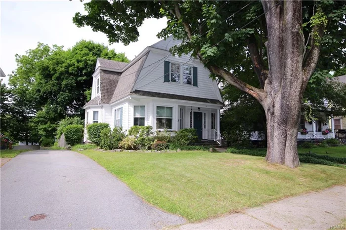 A marriage of Old world Charm and Upgrades! This charming dutch colonial sits in the heart of Woodbury. Located in the Monroe-Woodbury School district with exclusive rights to Woodbury Parks and Recreation.This is a commuters dream being less than a mile to I87, Palisades Parkway, Rte 17 , Woodbury Common, dining and entertainment. Minutes to West Point, Short Line Bus and Metro North. Step into the cozy foyer and into the main level featuring gleaming hardwood floors, period molding and built-ins. Enjoy the renovated kitchen with Cambria quartz counters and stainless steel appliances, updated powder room, and laundry room with new washer and dryer(2016) leading out to patio and fenced in back yard! Upstairs hosts the bedrooms and updated full bath. Plenty of closets and storage. If you still need more storage there is an attic and full basement! Upgrades include all new electric, two zone heating, newer roof , ductless conditioning, wifi thermostats, and hardwired for a generator.