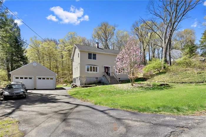 Four bedroom, three bathroom colonial style single family home for rent in Cortlandt Manor. This large and spacious home is in move in ready condition. The main floor consists of living room, formal dining room, large eat-in-kitchen and and one bedroom, with full bathroom. Enjoy the sights and sounds of nature on the huge deck just off the kitchen and mud rooms. The top level consists of three bedrooms, and two full bathrooms, with a master-suite consisting cathedral ceilings, large walk in closet and full bathroom with jacuzzi. Semi finished basement has high ceilings and is walk level to large back yard 1.7 acres of land, close to the reservoir.