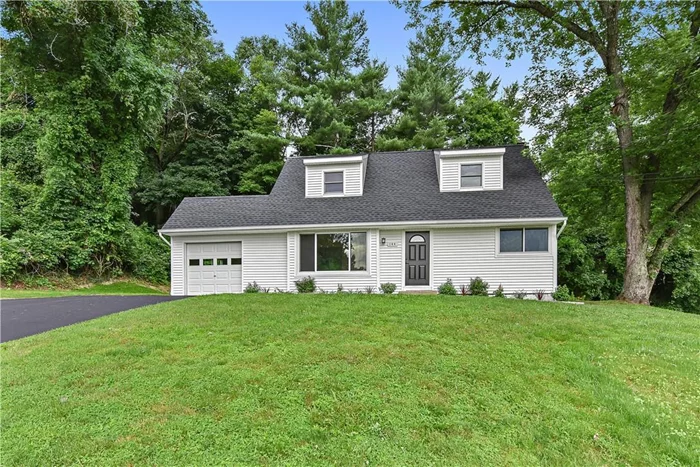 Spacious Cape on Cul-de-sac. Every inch of this home has been updated; new bathrooms, updated kitchen, new septic, freshly painted, hardwood floors, new roof and much more! Great curb appeal! The house is trimmed with garden beds, offers a level back yard and wonderful privacy, driveway recently sealed offering plenty of additional parking and a one car attached garage. Minutes to shops, schools, restaurants, train and more! STAR savings amount not reflected in taxes $2129.