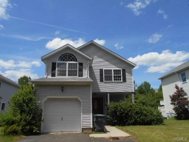 Spacious four bedroom colonial in quiet neighborhood. Some hardwood floors, eat-in kitchen and finished basement area for additional space.  Minutes to great shopping at Woodbury Common Premium Outlets and short drive to Interstate 87. Sold as-is. Buyer to pay NYS Transfer Tax. Offers with financing must be accompanied by pre-qual letter; cash offers with proof of funds.