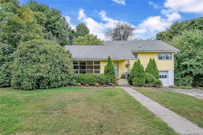 This delightful home has been loved by one family for 59 years. Enter into the sun filled living room w/custom picture window which flows into the formal dining room. Eat in kitchen looks into the spacious family room w/bar & SGD to over sized deck w/gazebo. A great flow for entertaining or large gatherings. The upper level features three large bedrooms & a full bathroom. The main level & upper level have been freshly painted & feature newly refinished hardwood flooring . A few steps down to a large den w/door to yard, garage & bathroom. The unfinished sub basement offers amazing storage, laundry, utilities & above ground oil tank (add&rsquo;l 570 sq ft not in total). This lovely home sits on .46 private, level, wooded acres. This home is surrounded w/mature landscaping & trees. A short ride to Metro North w/an hour to NYC via train. Easy access to shopping & major highways. Taxes do not reflect basic star rebate. All offers w/pre approval & proof of funds.