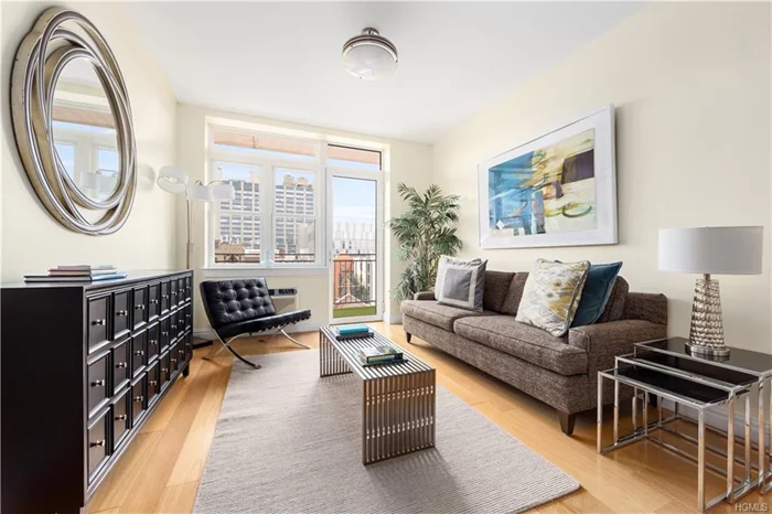 65% SOLD! OCCUPIED SINCE 2018!! MOTIVATED SELLER!!! Aka 70 WEST 139 St. 1005sf split 2BR/2BA market-rate sponsor unit with 91sf balcony features a stainless & granite kitchen, 9&rsquo; ceilings, wide plank oak floors, thru-wall PTAC for a/c & heat, full-size in-unit washer & dryer (vented) and a sun-filled south exposure with open city views. The building offers a 25-year tax abatement, virtual doorman, package room, 2 elevators, live-in resident manager, gym, common laundry, a 2500sf teak-furnished roof terrace with premium grass turf floor, ivy privacy walls and panoramic views. Private rooftop cabanas, storage cages, bike storage, covered & un-covered on-site parking equipped with electric vehicle charging stations are available for lease. Water, hot water and cooking gas are included in the monthly common charge. $30.20 monthly real estate tax with 421A ABATEMENT (APPROVED). 1 block from the ramp to the Harlem River Drive North. 4 blocks from Harlem Hospital and the 2 & 3 subways.