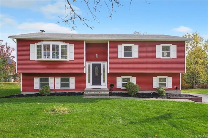 A tension free home of bright rooms in the Monroe-Woodbury School District. This bi-level home has been freshly painted and boasts hardwood floors on the main living floor. The inviting living room, dining room combination radiates charm and hospitality. Serenity is the mood of the three season porch; the perfect setting for a quiet afternoon of reading.  An efficient styled kitchen with ample storage & counter space will accommodate mealtimes to homework. Spacious family room designed for informal gatherings has a brick fireplace and new flooring. Comfort & coziness characterize the master bedroom & an updated master bath. All other bedrooms are generous in size. The hall bath has also been tastefully renovated. Enjoy over a half acre of flat property or if you&rsquo;re felling more social the Woodbury Pool and The Earl Reservoir which is Only Offered to Woodbury Residents!! Excellent commuter location just minutes to major highways and the Woodbury Commons.