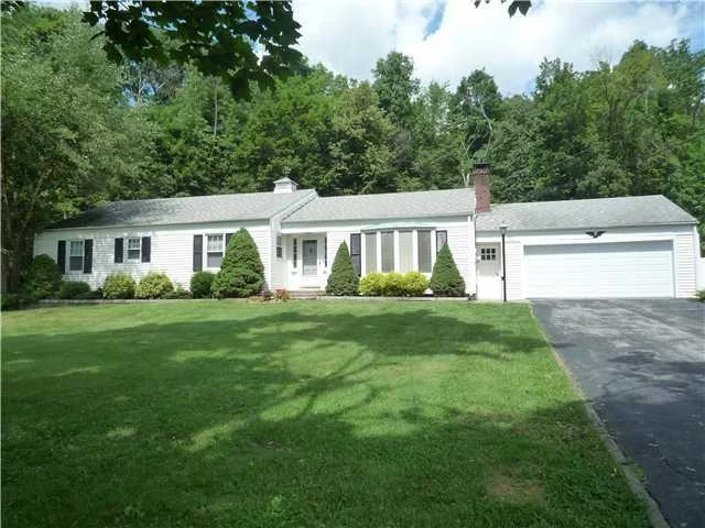 Spectacular sprawling ranch in one of the nicest areas of Woodbury. This home features a stunning chef&rsquo;s kitchen. Very high end cabinetry with Corian countertops, center island w/ down draft commercial stove.Top of the line appliances, motorized skylight, high hats, and undermounted cabinet lighting. Double oven and bread warmer. Waynes coating in living room w/ gorgeous hardwood floors, brick fireplace and wood holder. Formal dining room. Huge MBR suite w/ corian shower. Brand new main bathroom w/ imported ceramic and vanity. Large bedrooms . Full bsmt, bilco door. 2 car attached garage. Patio for entertaining. All on over 1.5 acres of privacy. 1 min to NYS Thruway and 5 min to train.