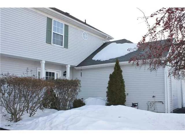 There&rsquo;s almost 1900 square feet of living space in this tantalizing tri-level townhouse! This home has been recently upgraded to include a beautiful ceramic tiled entry, wood floors in the living and dining rooms, new paneled doors, two updated bathrooms and a stunning new backsplash in the kitchen comprised of glass mosaic tiles. This wonderful home also includes a master suite with walk-in closet and attached full bath, two generously-sized secondary bedrooms, one-car garage, a deck off the dining room and a full finished walkout basement that provides ample space for additional bedroom or recreational space. Also enjoy the nearby Woodbury Recreations for swimming, hiking, tennis and more!