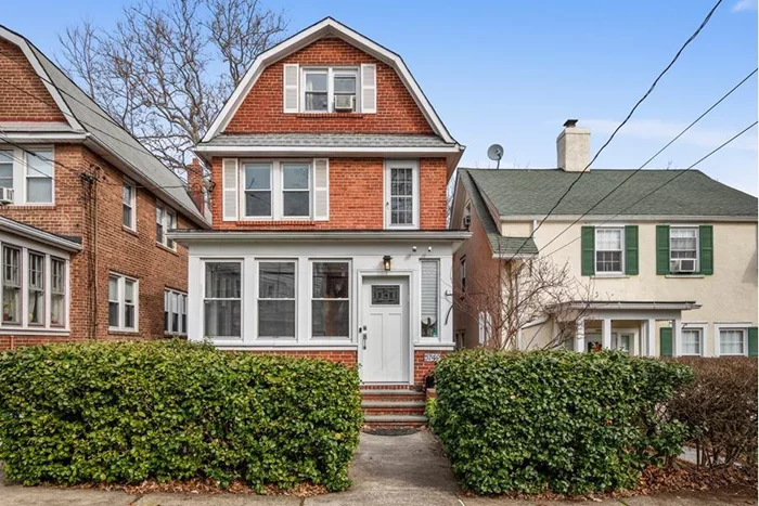 Built in the 1930&rsquo;s this beautiful brick home offers charm and character of past times, yet beautifully renovated and updated throughout. Enter a light filled sun-room with exposed brick and wall of windows, large living room and formal dining room with high ceilings, moldings and beautiful wood floors. The renovated kitchen is spacious with a center island and pantry and leads to a sunny deck. The second floor boasts three bedrooms and a full bathroom and the third floor an additional two bedrooms. The lower level offers a large open family room and full bathroom and utility room. The home has a pretty front garden and a garage behind the house. Conveniently located close to transportation, shopping, schools and parks.