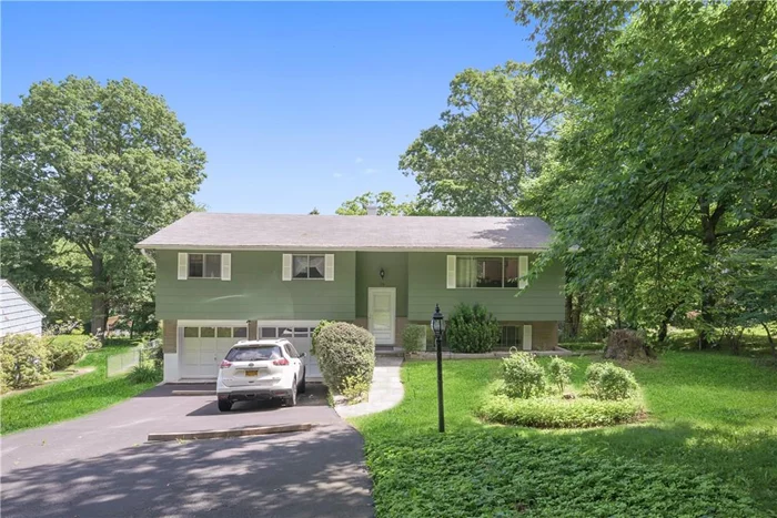 Let the sunshine in! Move right into this lovely, bright raised ranch which boasts hardwood floors throughout. Well equipped eat-in kitchen and dining room with sliding glass doors lead to huge deck overlooking lush third of an acre of property. Ensuite master bedroom and two additional bedrooms. Fully finished walk-out basement is perfect for a playroom or workout area. This house has so much potential. Bring your designing eye. Cortlandt Manor offers so much, from its cool Indie coffee shops, restaurants, and organic farms. This is the place to live for the outdoor enthusiast, just minutes from Blue Mtn., Harriman/Bear Mtn. State Park, the Hudson, Putnam Valley rail trail, and Croton Aqueduct Trail.