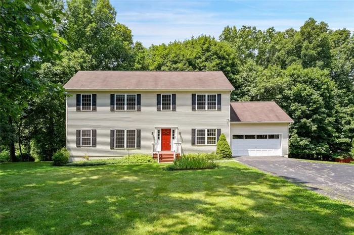 CREDIT TO BUYER OF $5, 000 AT CLOSING TO COVER TAXES. ***House over assessed AT $750, 000. Taxes are being grieved by owners. A potential 20% reduction (approximately $5, 000 reduction in taxes)***Gracious colonial on cul de sac; first time on the market. Custom built home with 5 bedrooms. First floor has a master suite with own private bath, open kitchen dining room layout with sliders to upper level deck. Privacy abounds with over an acre of wooded property. Formal living room, laundry center off of kitchen, office and an additional full bath for guests. Second level has a loft space, full bath and 4 additional bedrooms. One large bedroom currently being used as a bonus room with large walk in closet. Full unfinished basement and two car garage. Some additional features include, wood floors, central air, inground sprinkler system, set up for security system ADT, 9 ft ceilings first floor, installed 2015 new boiler, and hot water heater 2013. Close to shopping, parkways, schools and Metro North.    ***OIL TANK BEING REMOVED AND PLACED ABOVE GROUND***