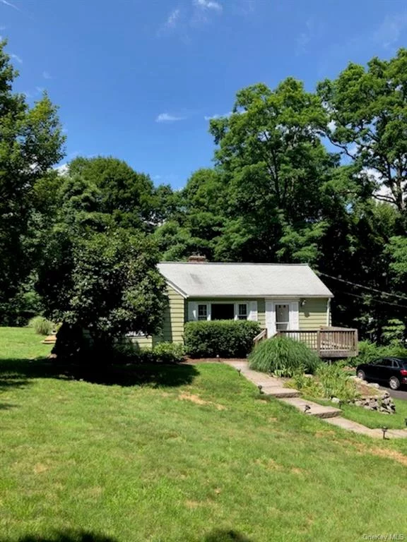 Over 1.25 acres in private setting with this 3 bedroom 1.5 bath cape. Commute to train to NYC, close to Woodbury Commons Outlets, Monroe-Woodbury School District. Close to interstate 87, route 17/6.