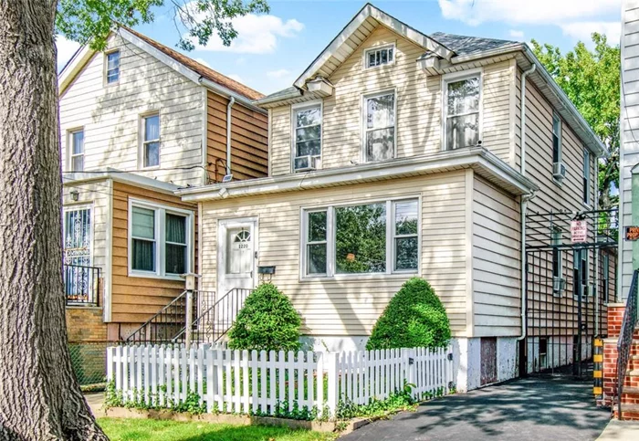 Lovely two family home in the heart of Pelham Bay/ Schuylerville section of the Bronx. Home features two spacious bedroom and a recently updated kitchen with espresso wood cabinets, stainless steel appliances and white countertops to match the floor tiles providing a modern touch. Next to the kitchen, you have a newly renovated bathroom followed by your living/bedroom. First floor features a spacious living room area sided by an opened sunroom area which is currently being used as an office space. Adjacent to the living room area is another room which is divided by a set of hand-crafted French doors preserving much of its traditional look. At the rear end, eat-in kitchen with access to the backyard. Home does include a full basement which can be easily used as a recreational room or storage area. Home includes a shared driveway which allows access to backyard parking up to 1 car. Perfectly situated on a quiet block just a short walk to the mass transit as well as local markets.