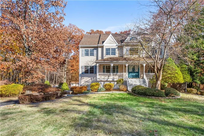 Center hall Colonial with rocking chair front porch situated at the end of a cul-de-sac! A welcoming home with a functional layout, the main floor has a 1st floor bedroom with connected home office and full bathroom, offering the opportunity for an au pair suite or master with dressing room. The large eat-in kitchen with center island, skylights and granite countertops opens to the cozy family room with fireplace and access to the very private and level backyard. There is also a large dining room and formal living room perfect for entertaining. A large walk-in pantry, and the laundry/mud room with access to the deck finish out this level. Upstairs, are 4 additional bedrooms, including the master with walk-in closet and ensuite,  plus the full hall bathroom. An unfinished walk-up attic with full size windows creates the opportunity for a media room, playroom, there are many possibilities! Outside is the beautiful yard complete with fenced vegetable garden and potting shed. Come and enjoy this perfect home!