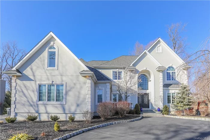 HGTV worthy completely updated Center Hall Colonial in the private enclave of The Greens of Woodbury. Soaring ceiling heights and walls of windows create an open floor plan that includes quiet spaces needed for work+study. The Kitchen+Baths are finished with timeless materials; marble, granite, stone, stainless + wood. Custom double entry doors reveal a stunning 2 story Foyer with curved staircase+arched doors to the porch. Chef inspired Kitchen with professional grade appliances, great storage+work surfaces opens to the Great Room with floor to ceiling fireplace and Palladium windows + access the outdoor entertaining spaces. The 2nd floor Master Suite includes a Spa Bath and walk in California Closet. 3 more spacious bedrooms with cathedral ceilings and 2 hall baths. Lower level has 9&rsquo; ceilings to create a gym, theater, game room or man cave  Enjoy top ranked Monroe-Woodbury Schools, nearby state parks, Storm King, Hudson River Towns and premier shopping!