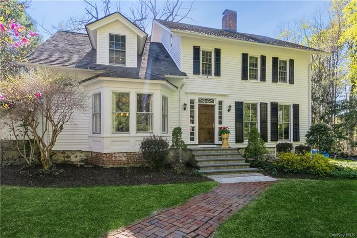 This 1810 historic home has the charm and nostalgia of the bygone era with modern amenities. It was completely renovated in 2012 by its current owners and just an 8-minute stroll to the Metro-North train station and the thriving village of Katonah with its beautiful shops and restaurants; this is a perfect commuter home. Nestled in 0.5 acres of beautiful trees, plantings, and landscaping, this home offers the perfect outdoor entertaining space with a fish pond, sunny patio, and hot tub. The home boasts 4 bedrooms, 3 baths, and is cozy and spacious at the same time - read a book by the fireplace in the study, enjoy dinner parties in the warm dining room or entertain in the open plan kitchen/living area with yet another fireplace. The primary bedroom is a delight with its gas fireplace, superb en suite bathroom, and recessed reading area. Exposed beams pegged wide plank antique floors, first-floor laundry, and renovated kitchen and baths are just a few of the attractions at this exceptional home.