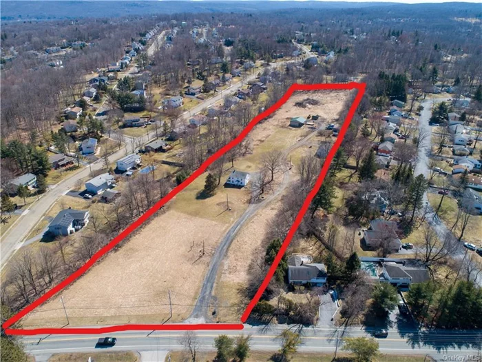 OPPORTUNITY & LOCATION! RARE 7.1 Acre Lot in the VILLAGE OF MONROE with ALL Municipal Services: Gas, Water & Sewer! BONUS: 3 Rentals on the property consisting of a 5 Bedroom/2 Bathroom Home, 2 Bedroom/1Bathroom Home & A Detached 1, 500SF Garage. All Month To Month and Totaling $6, 000, Monthly Rent. Perfect for Seniors or Affordable Living Project or for Single Family Homes. The Site is Flat, Wide Open & is Located in the Sewer district.  Extremely Close Proximity to Supermarket, Shops, Restaurants, Houses of Worship, Buses, Train & Other Transportation Dial-A-Bus. Proximity to NYC (45 miles), 10 minutes to Legoland and 2 minutes to Woodbury Commons....and so much more. Directly Across the Street from The Monroe Golf Course, too! Endless Possibilities. Take Action!