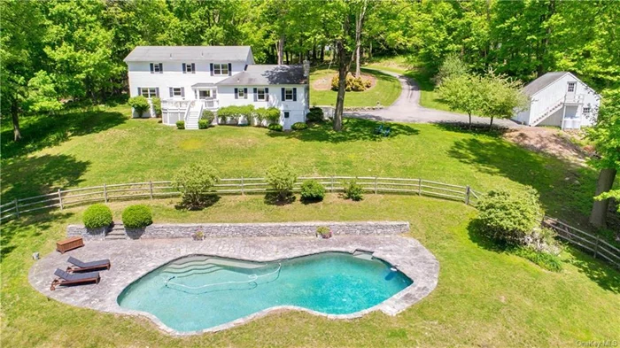 Katonah Gem on Mt. Holly Road! Welcome to this warm & inviting country home nestled on 5 acres with a sparkling gunite pool. This home features: Long private drive; beautiful land with stone walls, towering maple and tulip trees, lilacs & rhododendrons color the landscape; pole barn with unfinished loft space; full-house generator; stone terraced pool with southern exposure, large deck with views of the pool; hardwood floors, fireplace, new stainless-steel appliances create a terrific living space with eat-in-kitchen open to family room & bonus room. The large en-suite Master bedroom has a walk-in closet. Numerous closets provide plenty of storage space. Fresh paint in many rooms. Peaceful & very private, yet convenient to Katonah Hamlet, schools, parks, train, great restaurants & all Katonah has to offer.