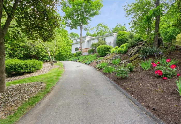 Turn the key and move right into this Colonial on an acre of land with beautiful landscaping . First floor features: Entry hall w/cathedral ceilings & 2 walk in closets, flows into living room, formal dining room, a cedar 3 season room, large eat in kitchen with granite counters & backsplash, cherry cabinets, Sliding glass to deck & pool, cozy family room with stone wood burning fireplace. full bath, large office/guest bedroom/nanny suite with built in shelves & roll top desk. 2nd floor has hardwood floors under carpets, Master suite w/bath, walk in California Closet, 2nd bedroom w/walk in closet, 3rd bedroom w/walk in closet, hall bath with jacuzzi, sound proof music room/office/bedroom. A few of the many upgrades include: Generac 20KW full house generator. Sunrun 35 panel solar system, security system, sprinkler system, central vac & air conditioner, natural gas pool heater, storage garage. This home is set back from street with privacy. Move in and plan your barbeque & pool party!